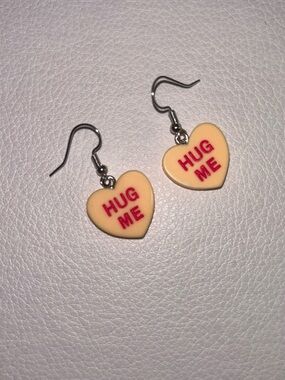 Conversation Hearts HUG ME Drop Earrings in Orange with Pink Lettering